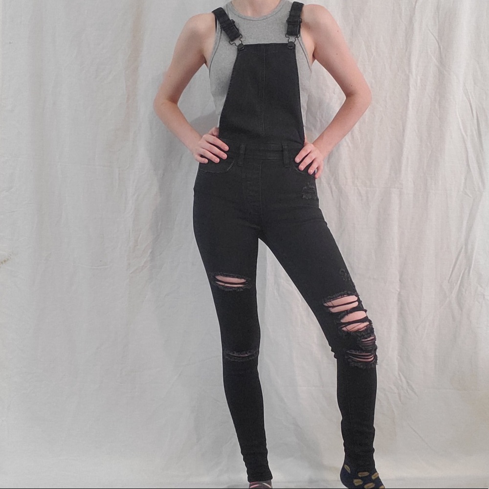 Fitted black distressed overalls size 0